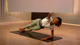 Aditi Shah demonstrates a pilates ab exercise in Peloton class 
