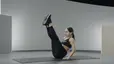 Olivia Amato demonstrates a V-Sit exercise