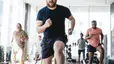 Man doing cardio exercise in a class at the gym