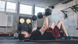 Man does chest exercise with dumbbells