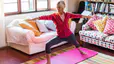 Woman practices yoga at home 