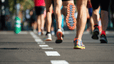 Shot of man running race with bottom of sneaker showing — Getty Images (Pavel1964)