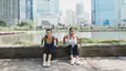Two women exercise outdoors
