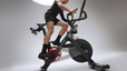 Man doing an FTP cycling test on a Peloton bike.