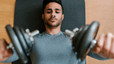 Man lifting two dumbbells
