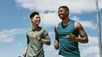 Two men jogging outside