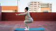 Woman does squat variations outside