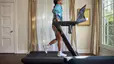 Woman does a treadmill workout for beginners