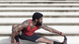man stretching before a workout