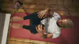 man doing mat pilates class