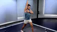 Matty Maggiacomo demonstrates a resistance band tricep extension