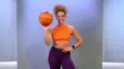 Peloton instructor Jess Sims poses with a basketball for her strength for basketball program on the Peloton App