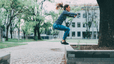Woman does a jump squat, one of the best plyometric exercises