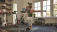 Woman does a strength training workout at home