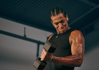 man doing biceps curl