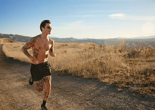 An running outside as part of Peloton's marathon training plan.