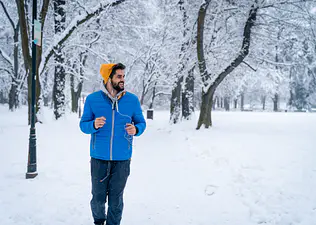 Man running outside in the winter