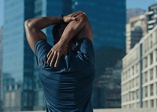 Man stretches upper body