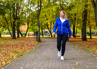 Woman walking outdoors
