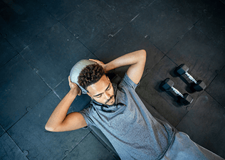 Man doing core work at the gym