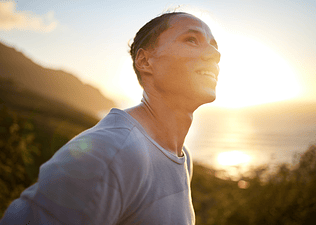 Man on an outdoor run using running mantras to focus.