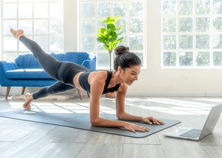 Woman exercises at home, a low-impact workout 