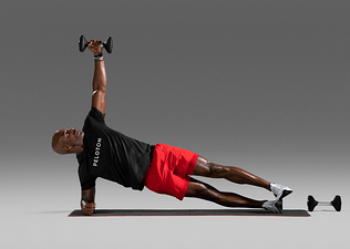 Instructor Adrian Williams doing side plank