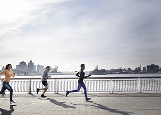 Runners outside try to achieve a negative split during a race