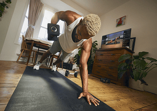 man doing dumbbell rows