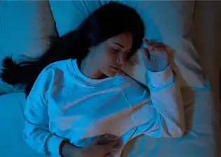 Woman asleep in bed