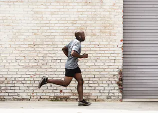 Man runs and jogs outside