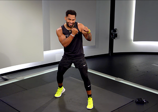 Rad Lopez demonstrates an uppercut punch in a Peloton shadowboxing class