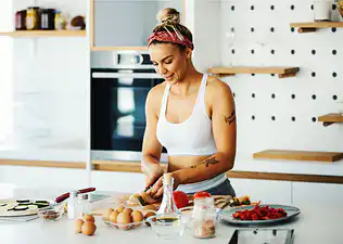 Woman preparing a meal in the kitchen