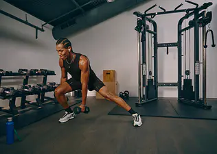 Man doing a strength workout in the gym.