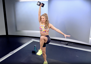 Rebecca Kennedy demonstrates standing core exercise 