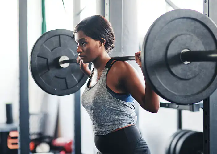 Woman lifting barbell