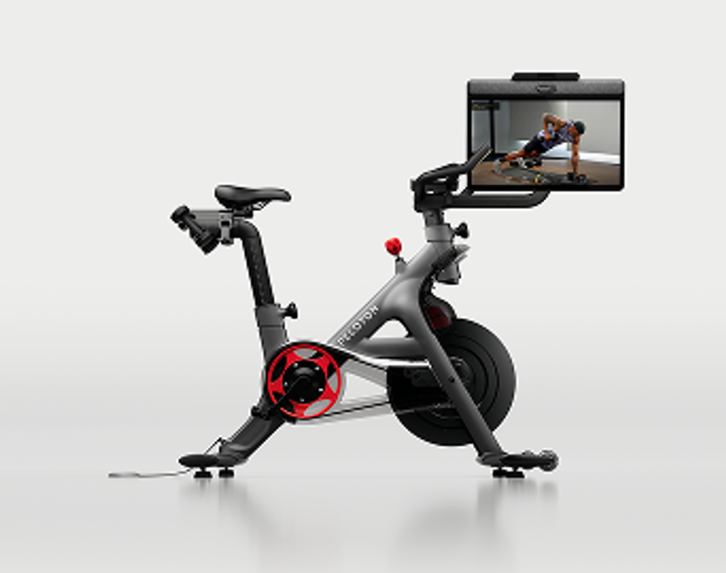 Peloton Bike+ smart exercise bike with 23.8 inch swivel HD touchscreen