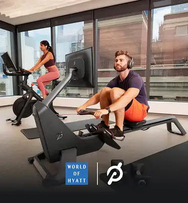 people using Peloton equipment in Hyatt hotel