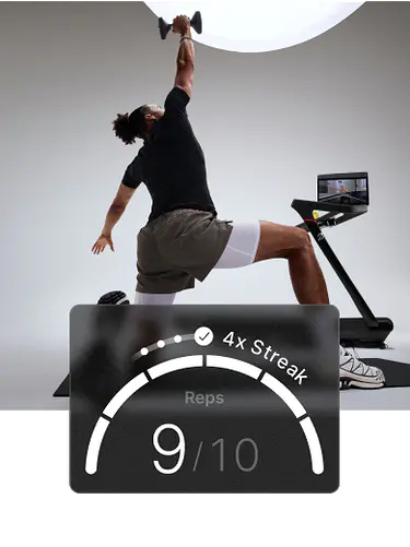 A man is kneeling on a mat with one arm extended overhead, holding a dumbbell, beside a Peloton Tread+. Overlay shows “Reps 5/6.”