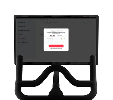 Peloton Bike screen showing credit card payment information pop-up.