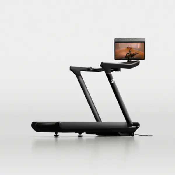 Peloton Tread with a sleek black frame and large built-in touchscreen display