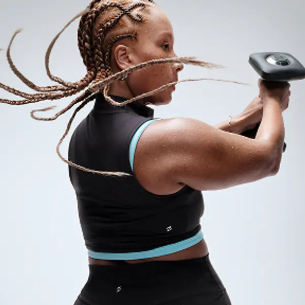 Woman doing a weight training exercise