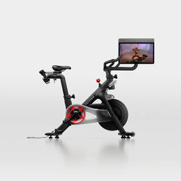 Peloton Bike with a large touchscreen display in a studio setting