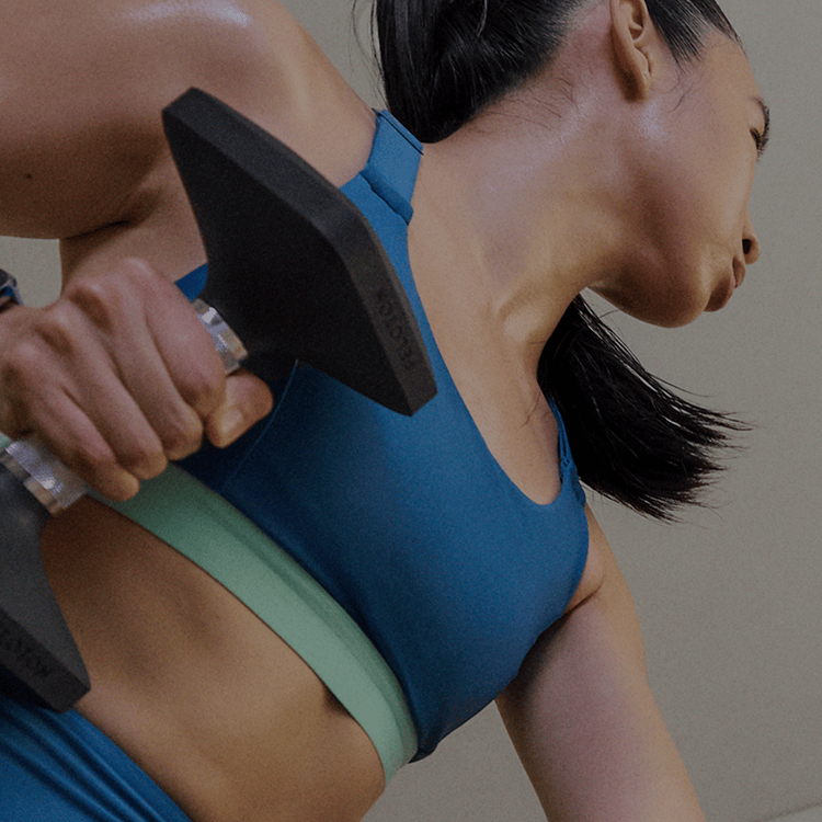 Woman lifting dumbbell