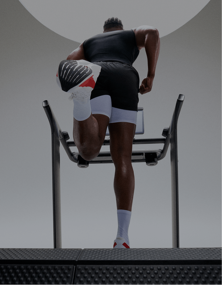 Man running on Peloton Tread+