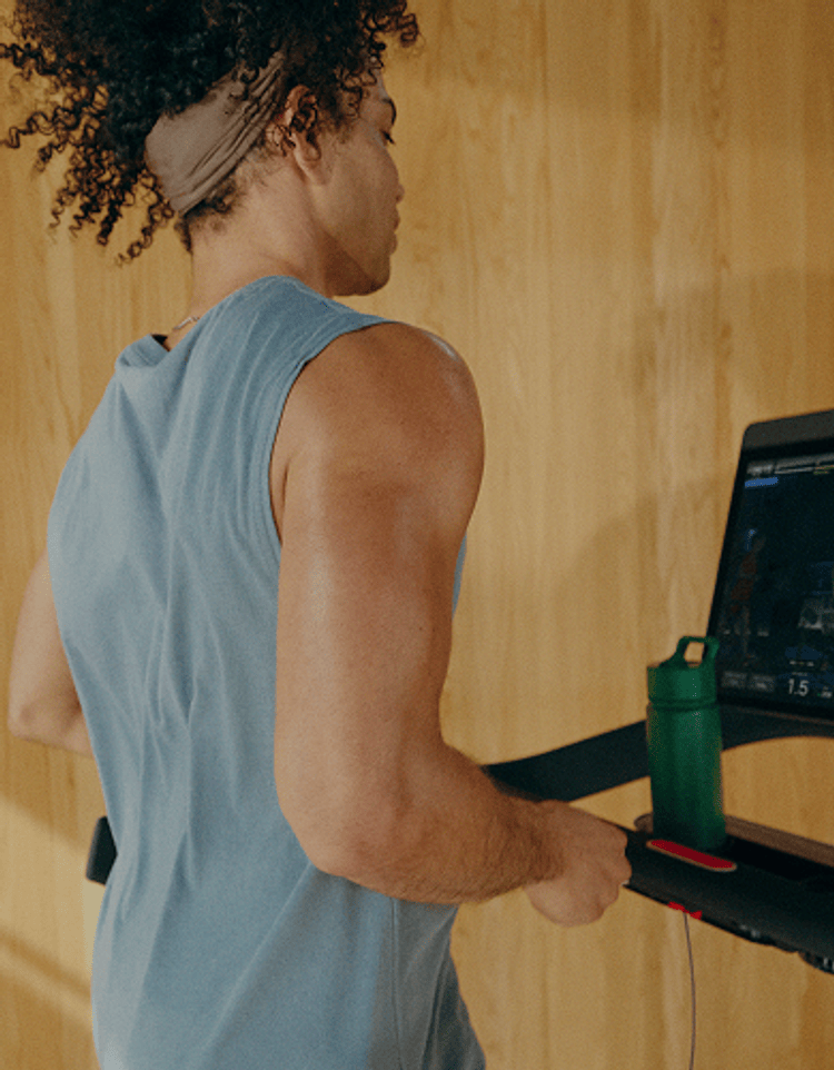 Member on Peloton Tread