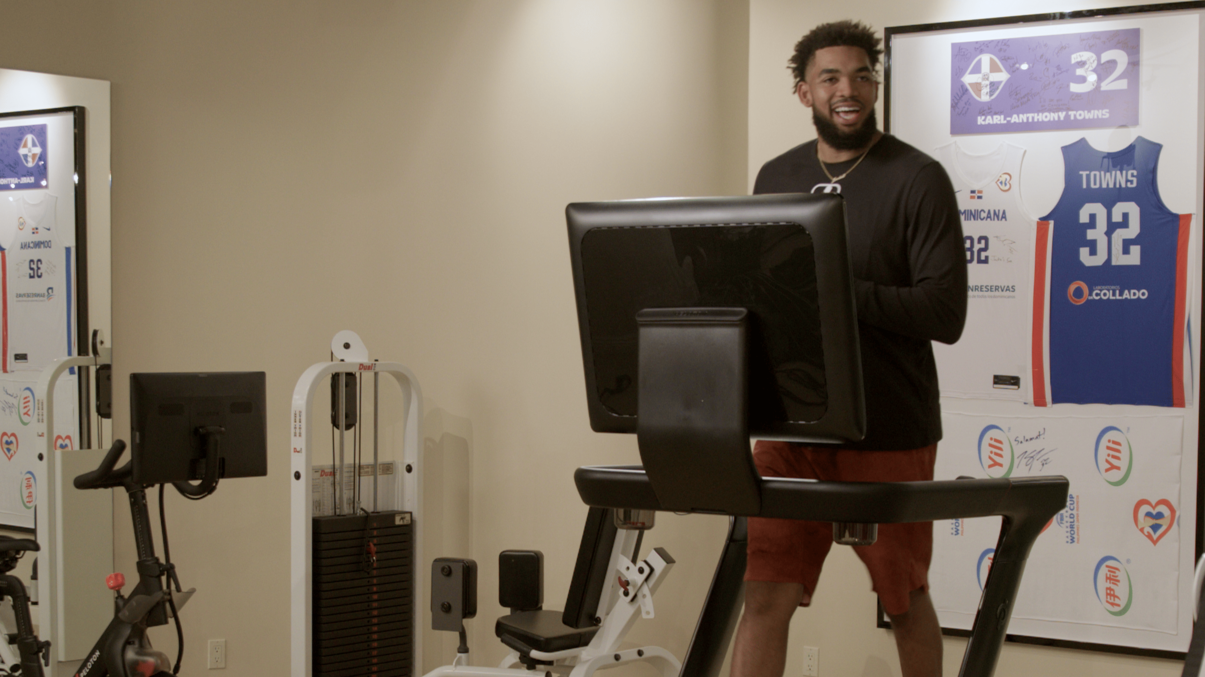 Karl-Anthony Towns walks on a Peloton Tread+
