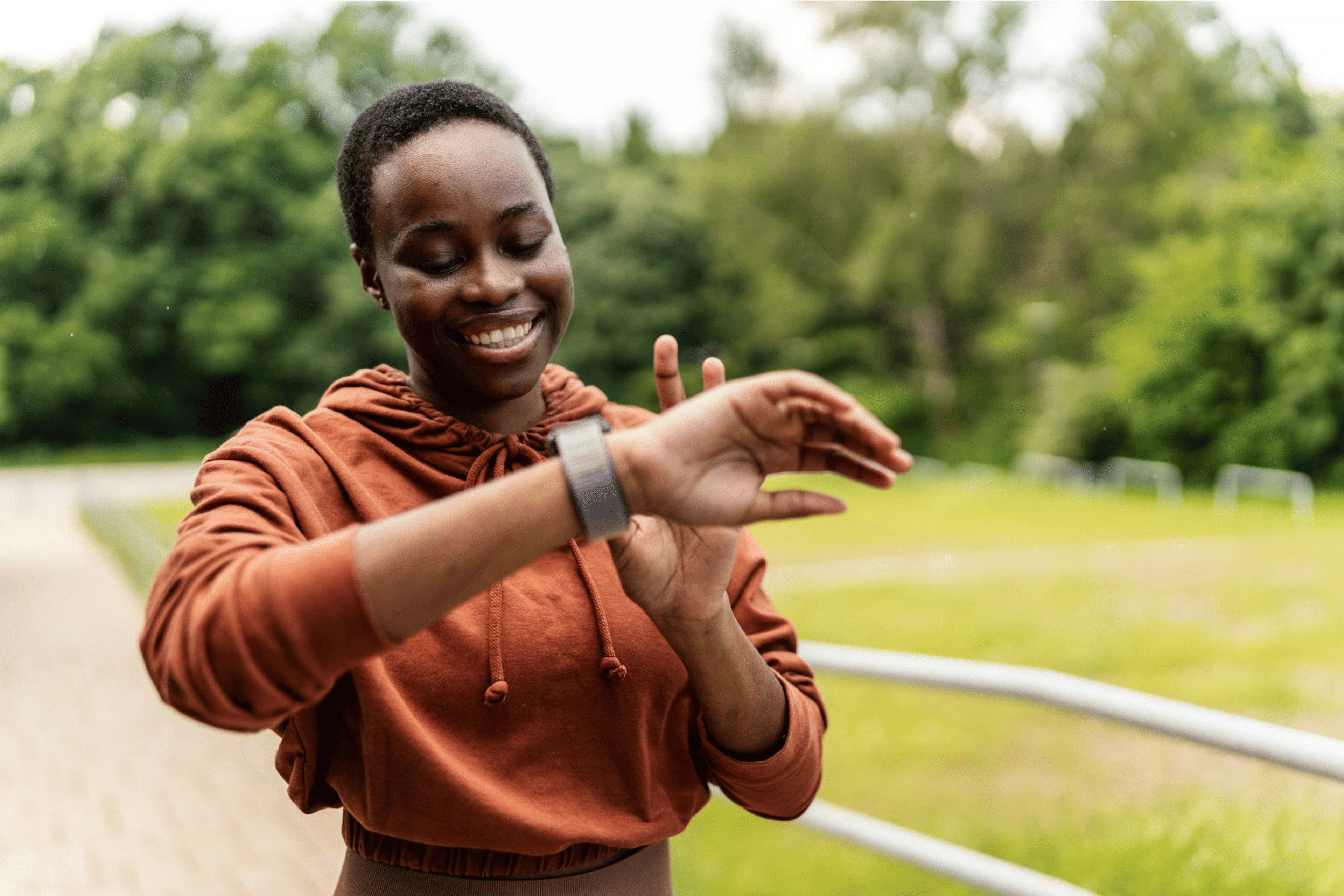 Woman checking heart rate watch