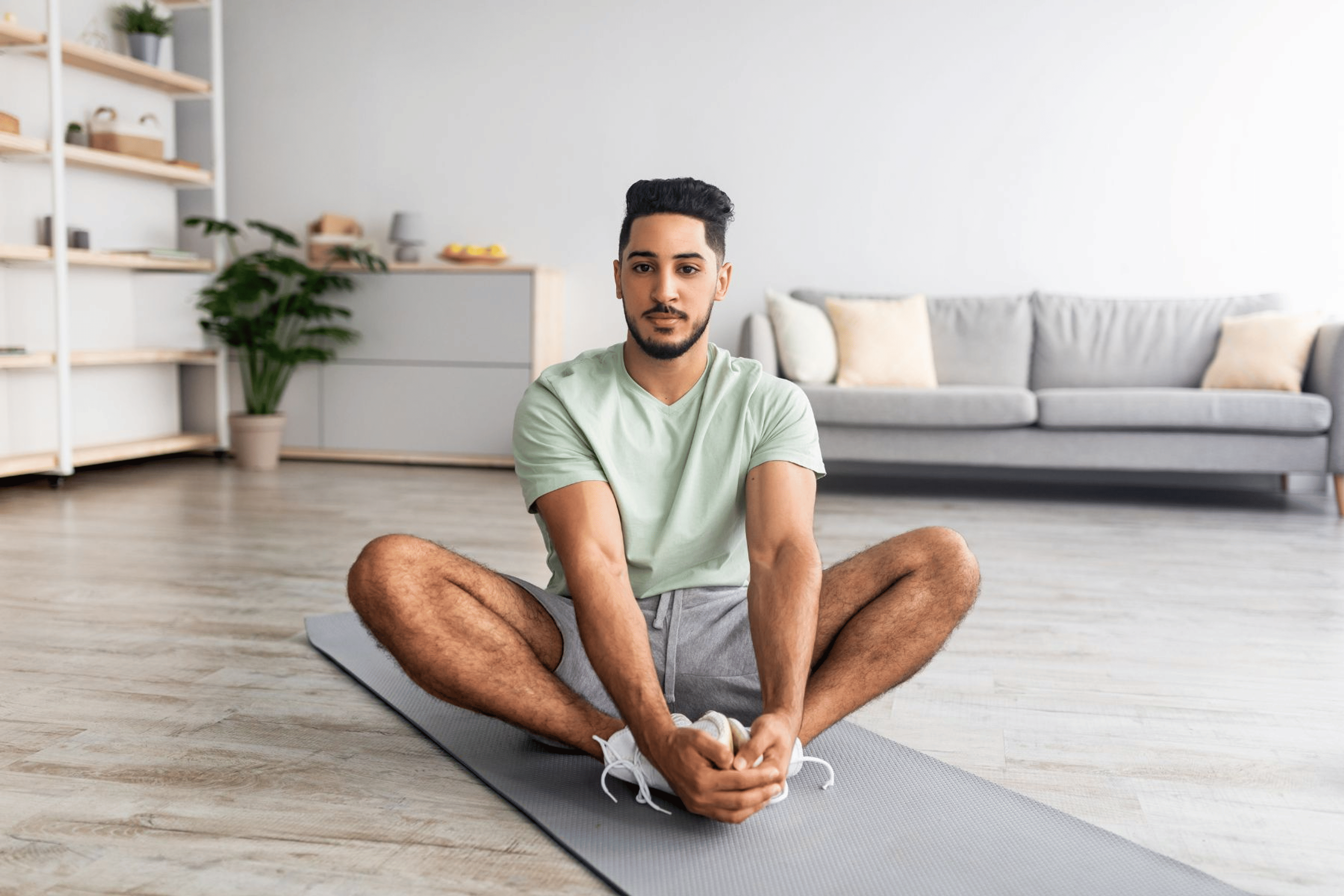 Man doing the Butterfly Stretch