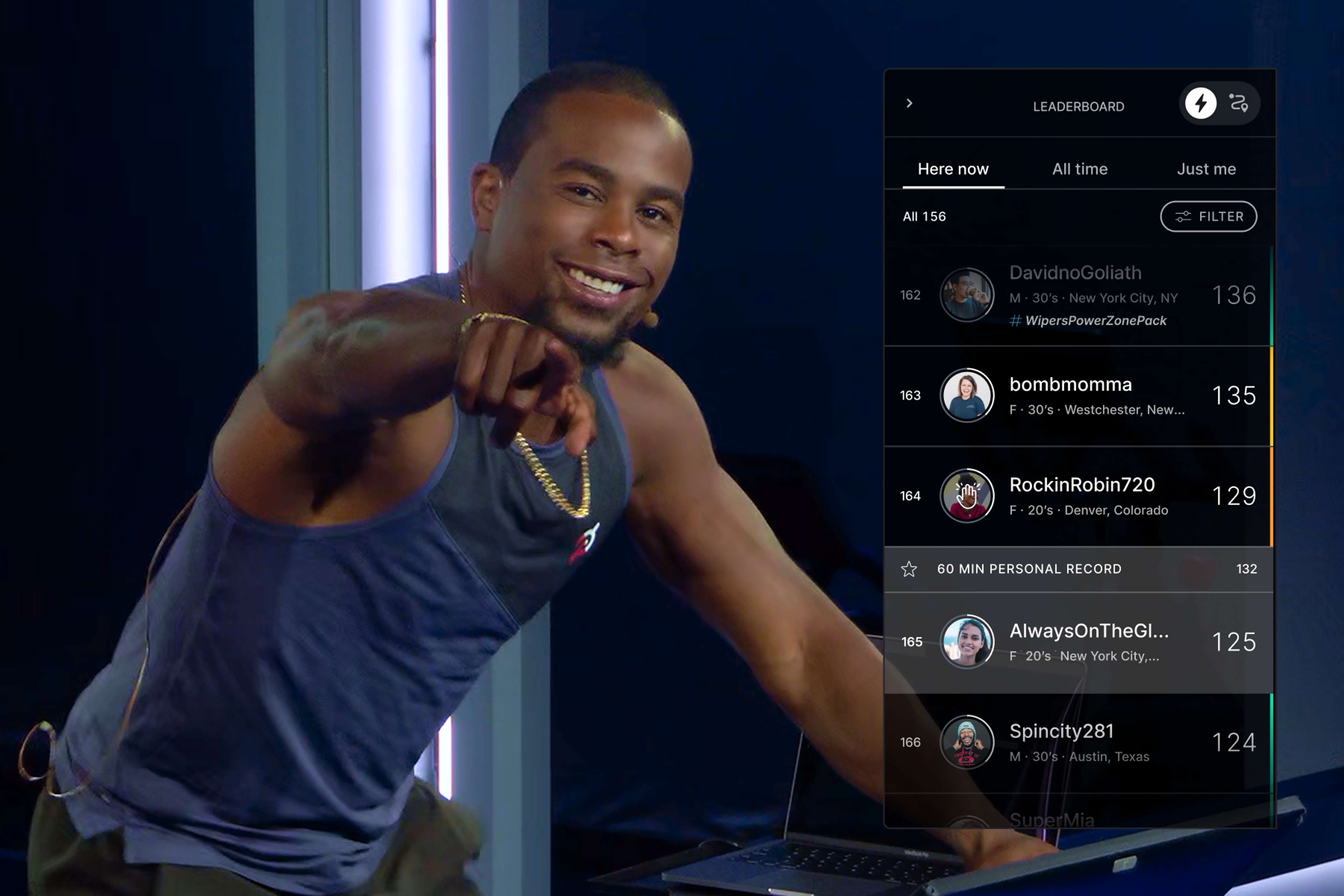 Alex Touissant peloton class with leaderboard and high fives